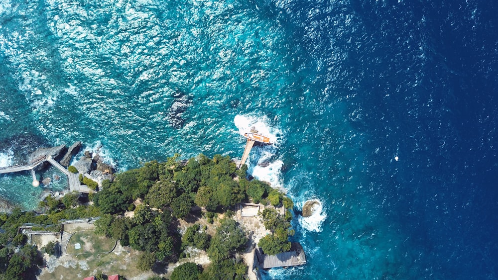 an aerial view of a small island in the middle of the ocean