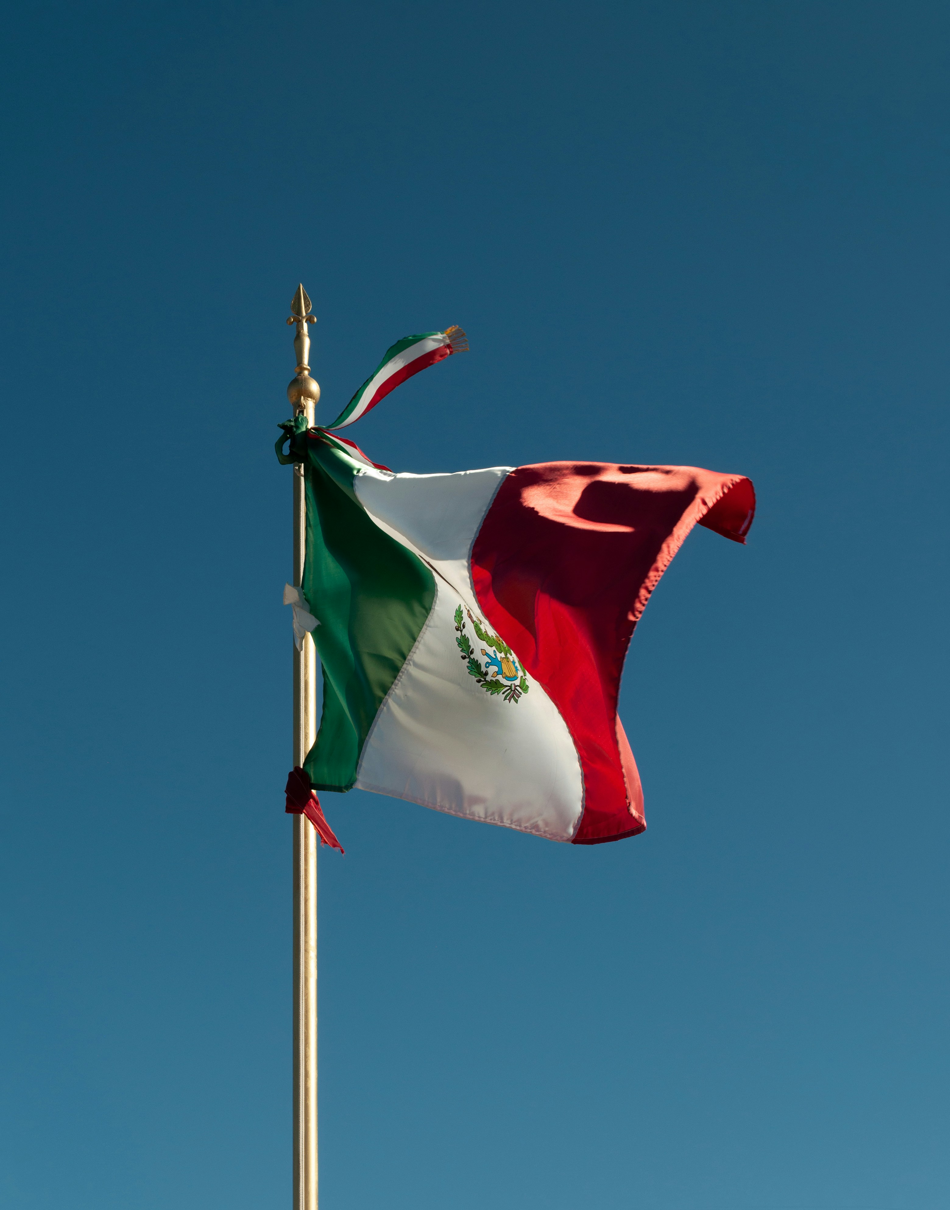 Flags of the United States, Canada, and Mexico side by side