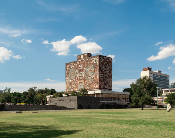 a large building with a clock on the side of it