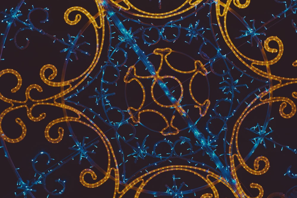 a blue and yellow pattern on a black background