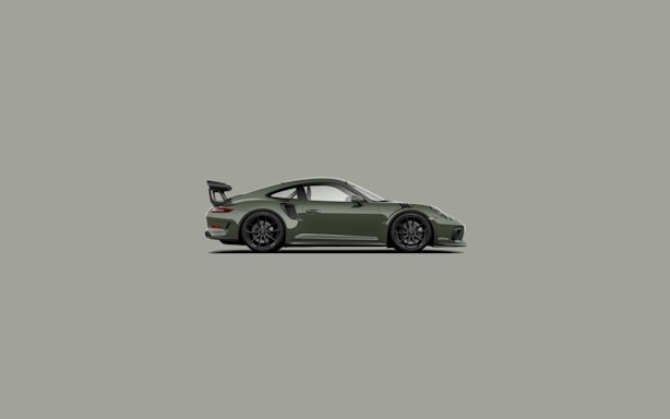 A sleek dark green car silhouette against a clean white background with subtle black accents.
