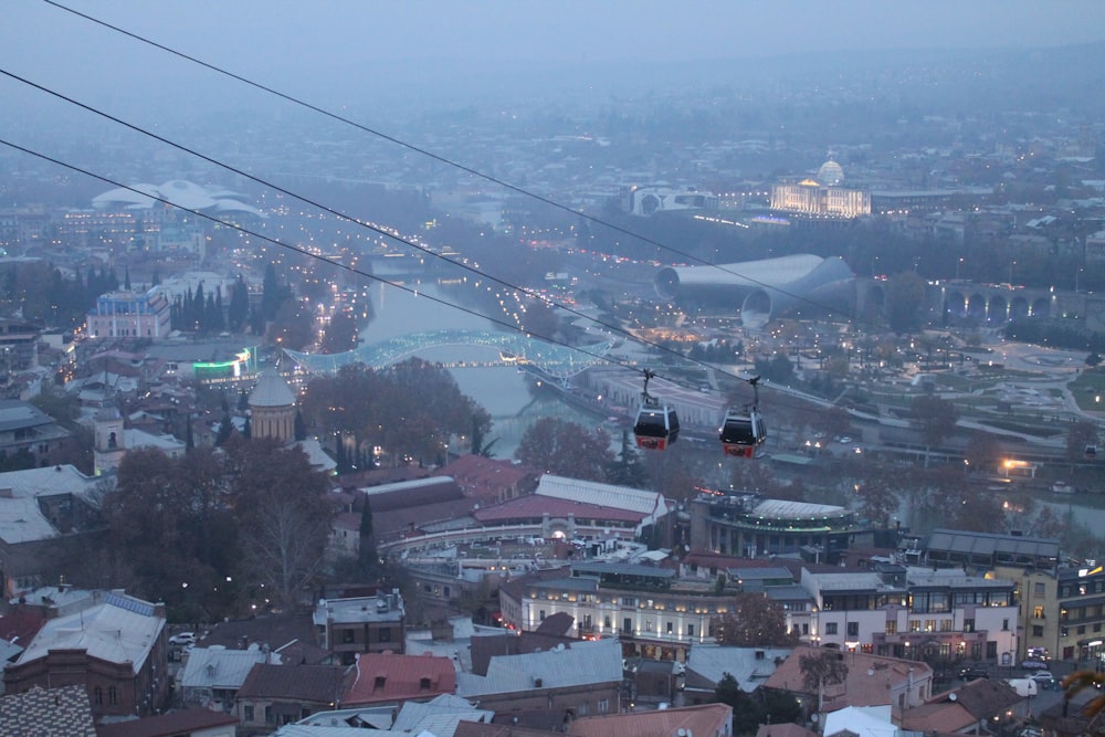 a view of a city from a cable car