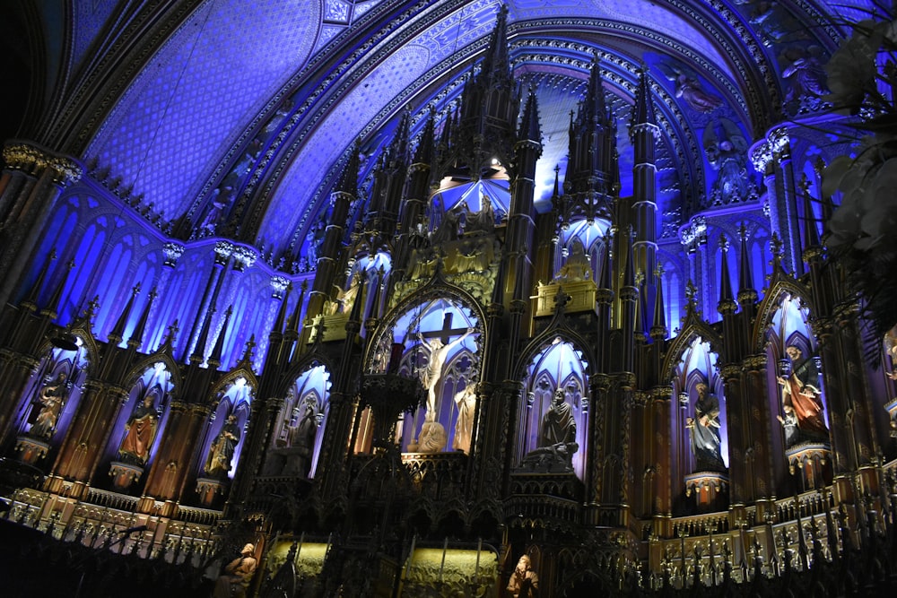 a large cathedral with a blue light in the ceiling
