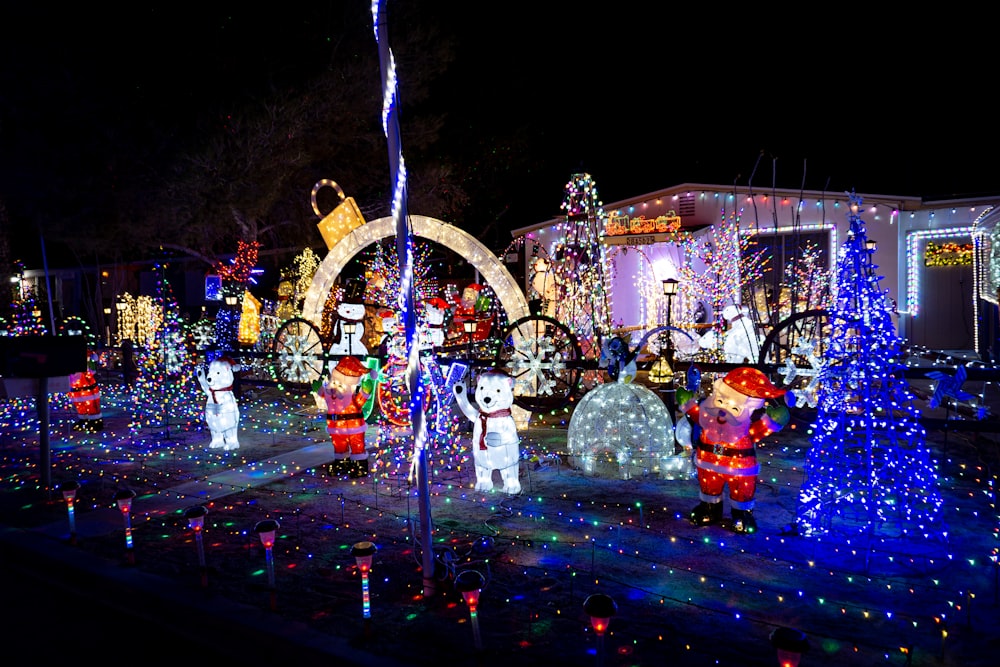 a house covered in christmas lights and decorations