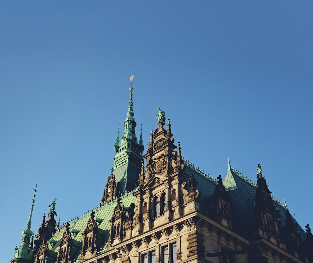 a very tall building with a clock on it's side