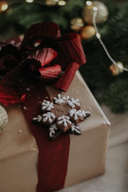 A beautifully wrapped gift box with a ribbon.