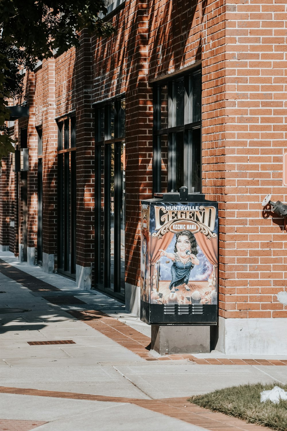 a movie poster on the side of a building