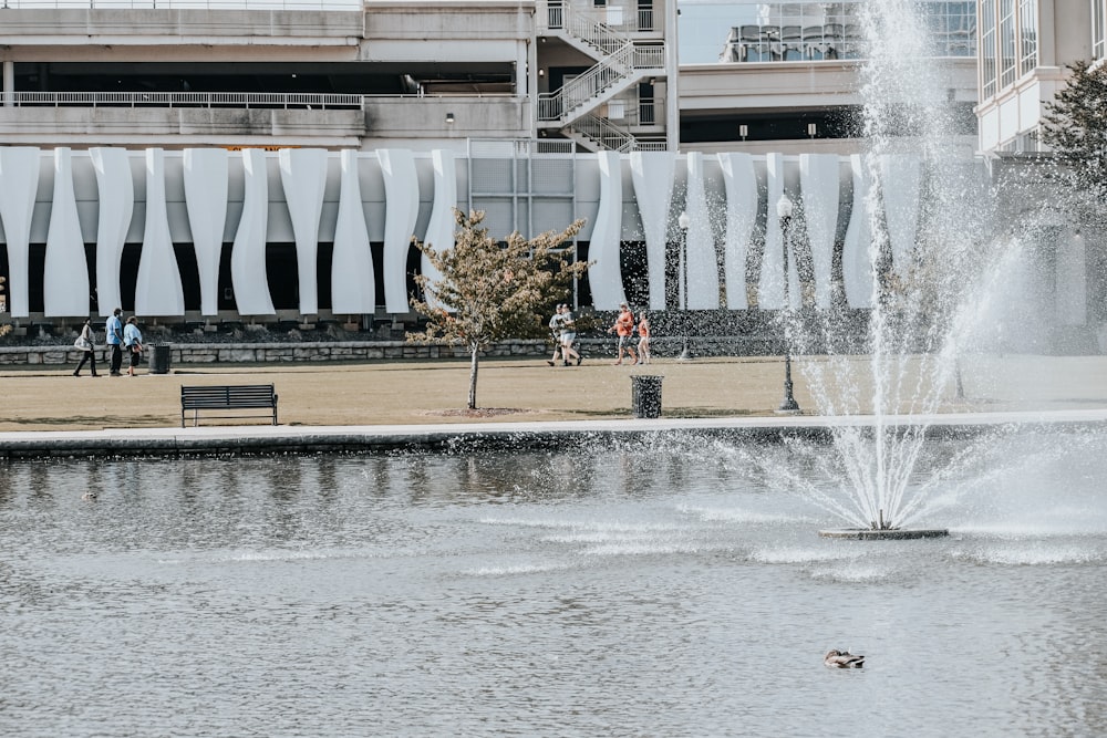 a water fountain in front of a building