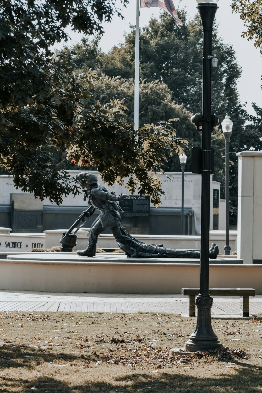 a statue of a hockey player on a bench