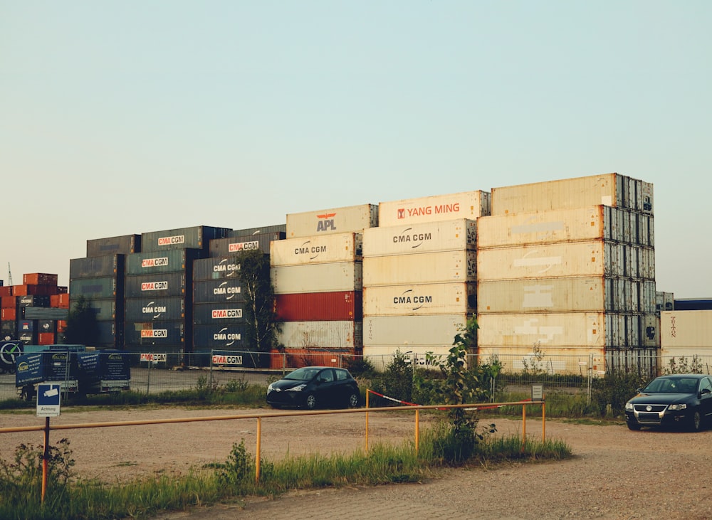 two cars are parked in front of a building