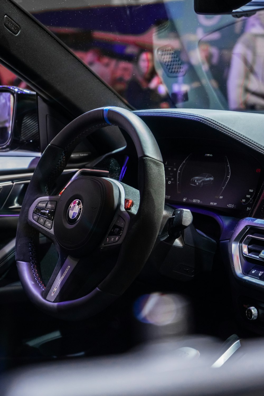 the interior of a car with a steering wheel