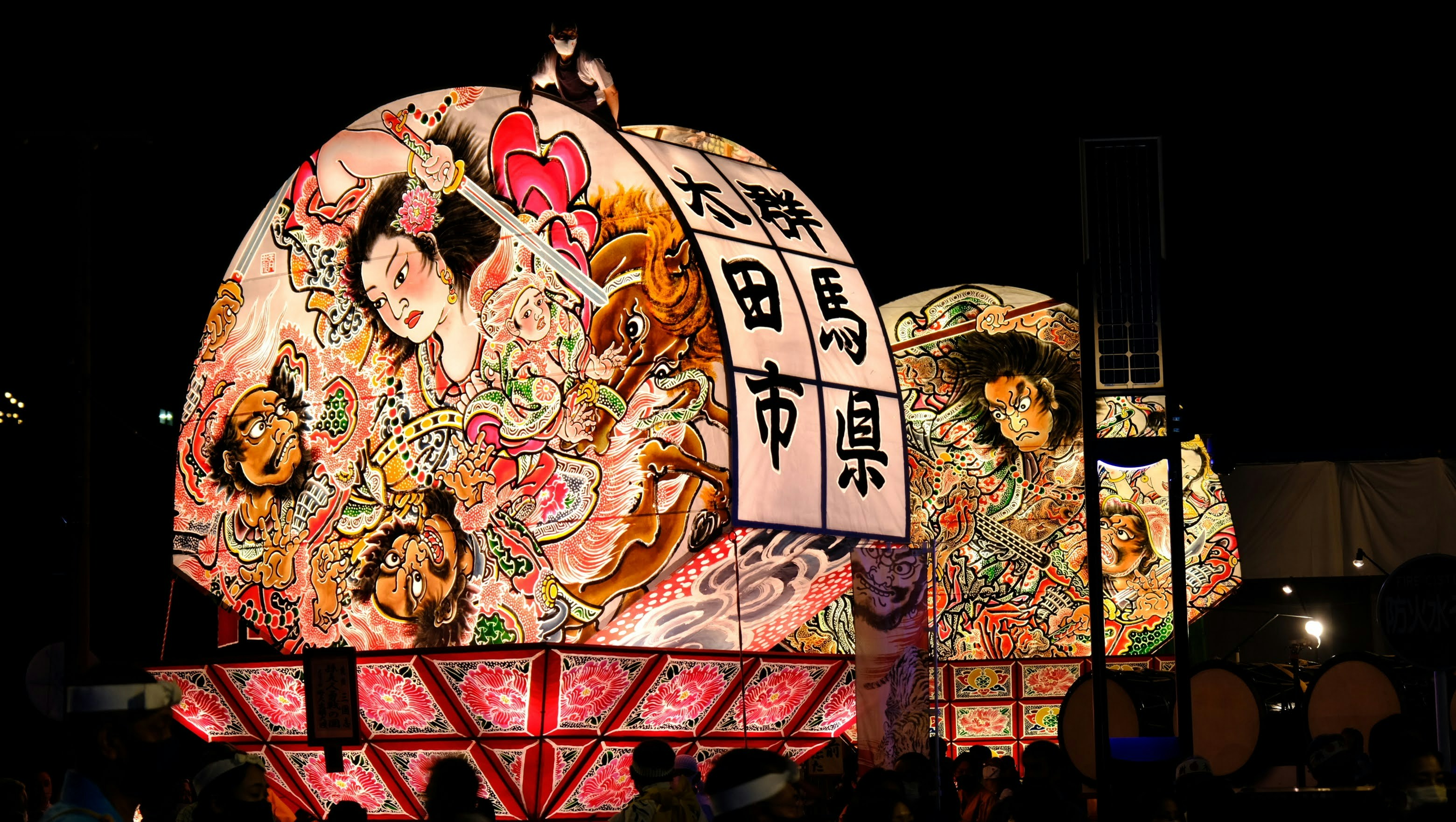 a large display of asian art at night