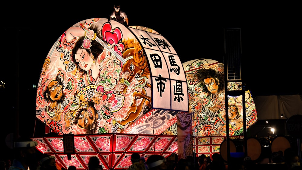 a large display of asian art at night