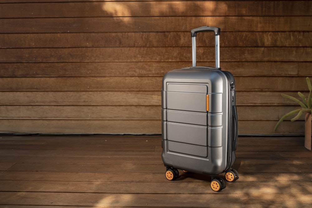 a piece of luggage sitting on top of a wooden floor