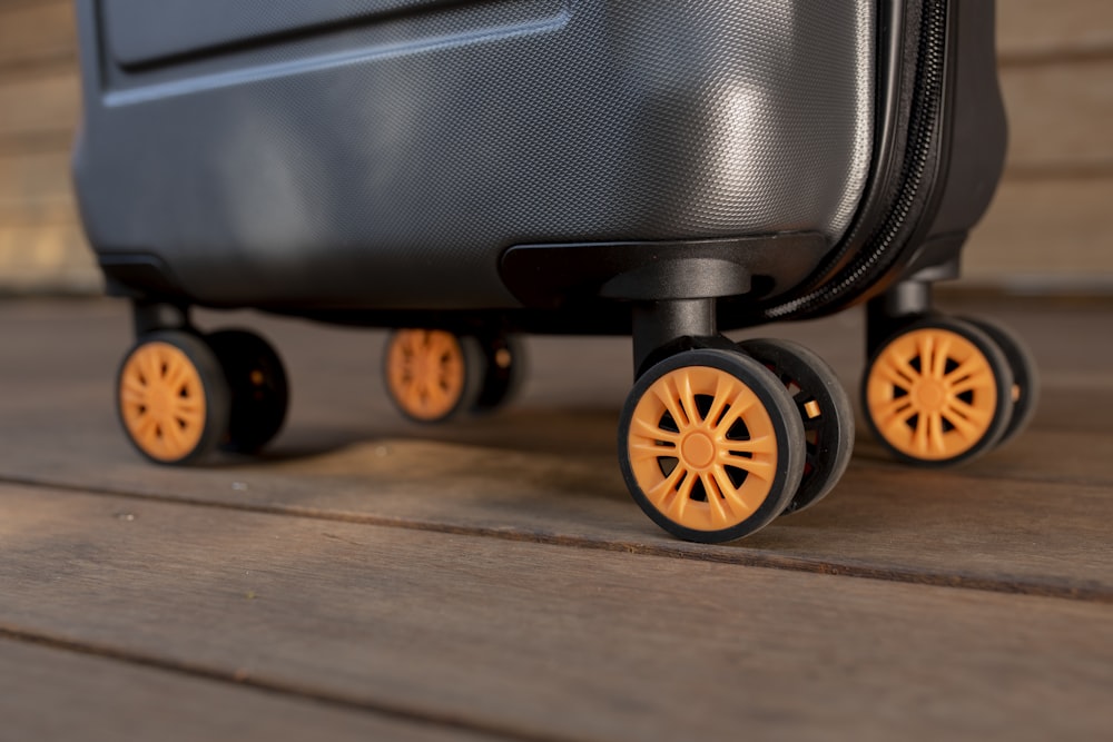 a piece of luggage sitting on top of a wooden floor