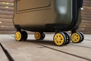 a piece of luggage sitting on top of a wooden floor