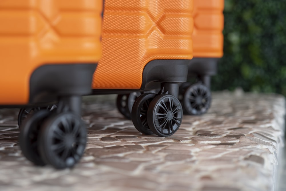 a close up of two pieces of luggage on a table