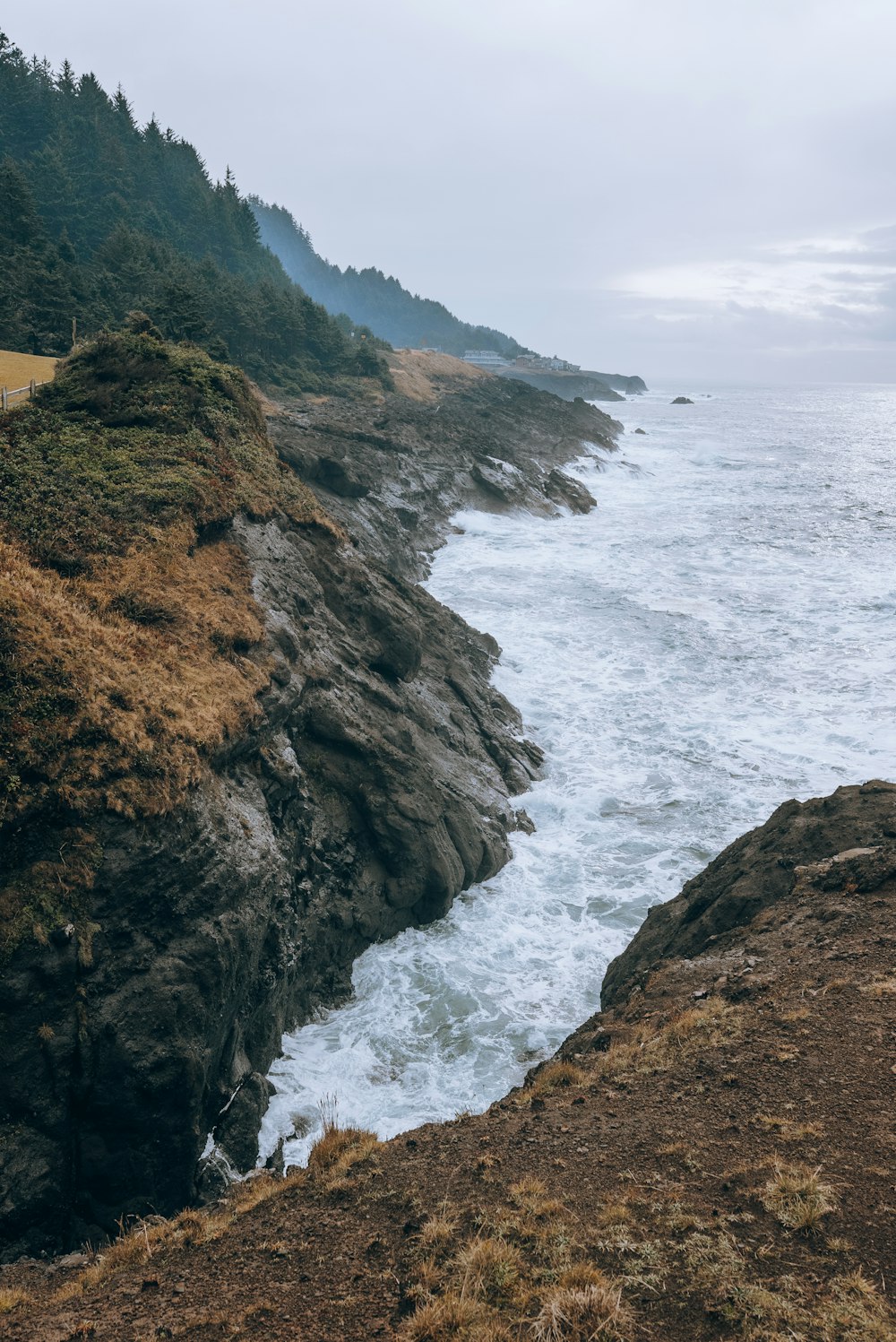 a view of the ocean from a cliff