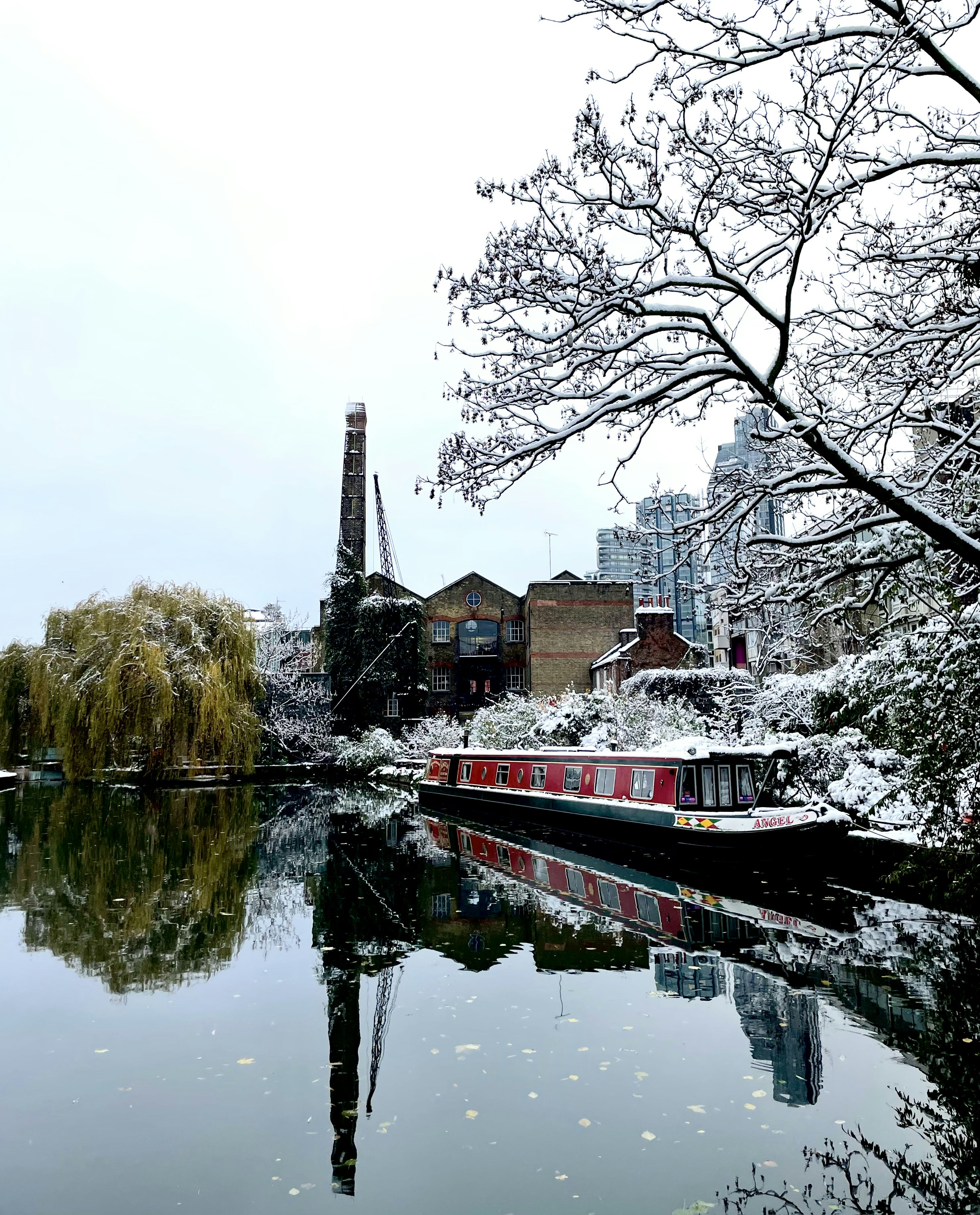 a boat on a river in a city