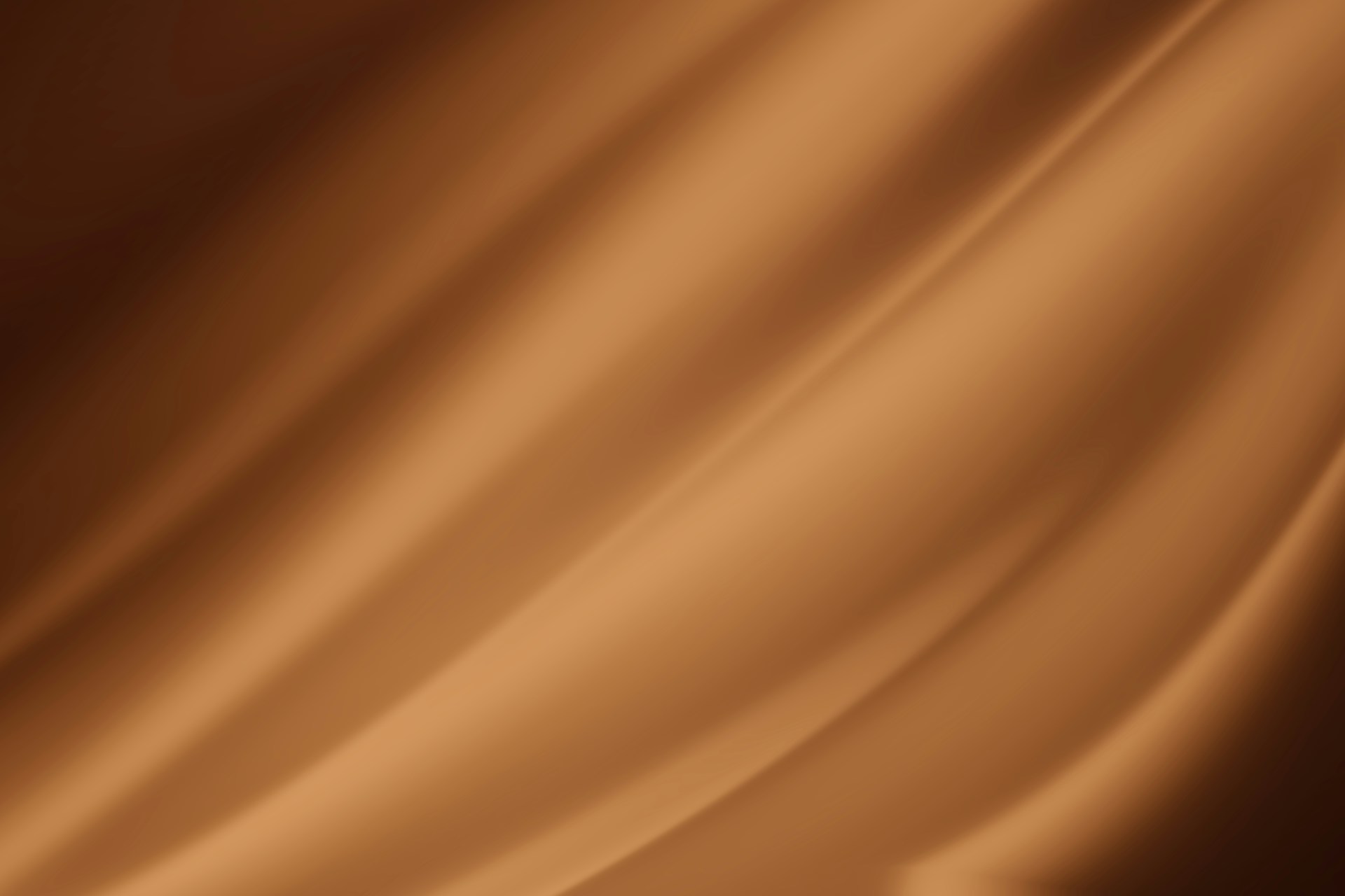a close up of a brown satin background