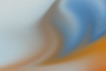 a blurry image of an orange and blue background