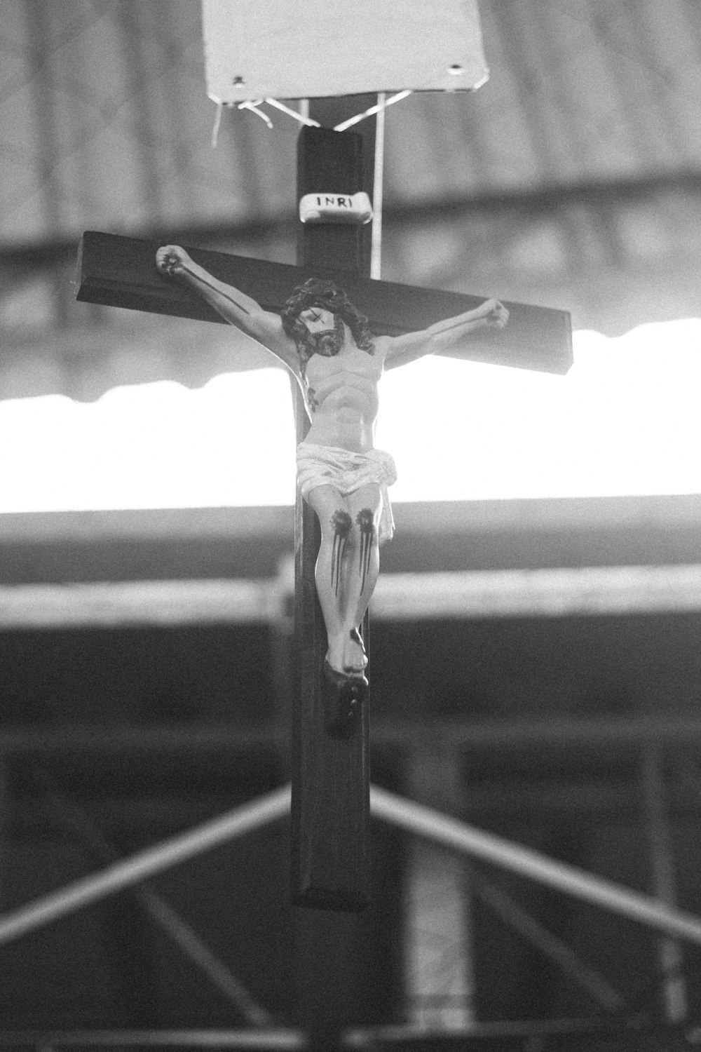 a black and white photo of a crucifix