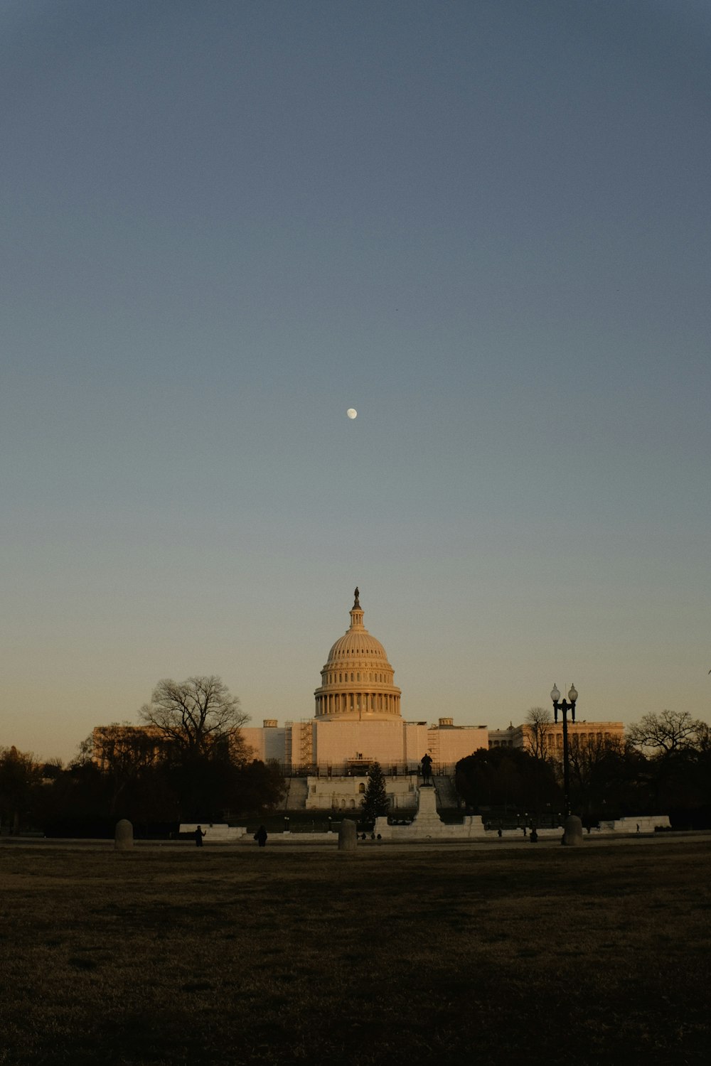 the dome of the u s capitol building at dusk