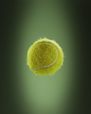 a tennis ball is flying through the air