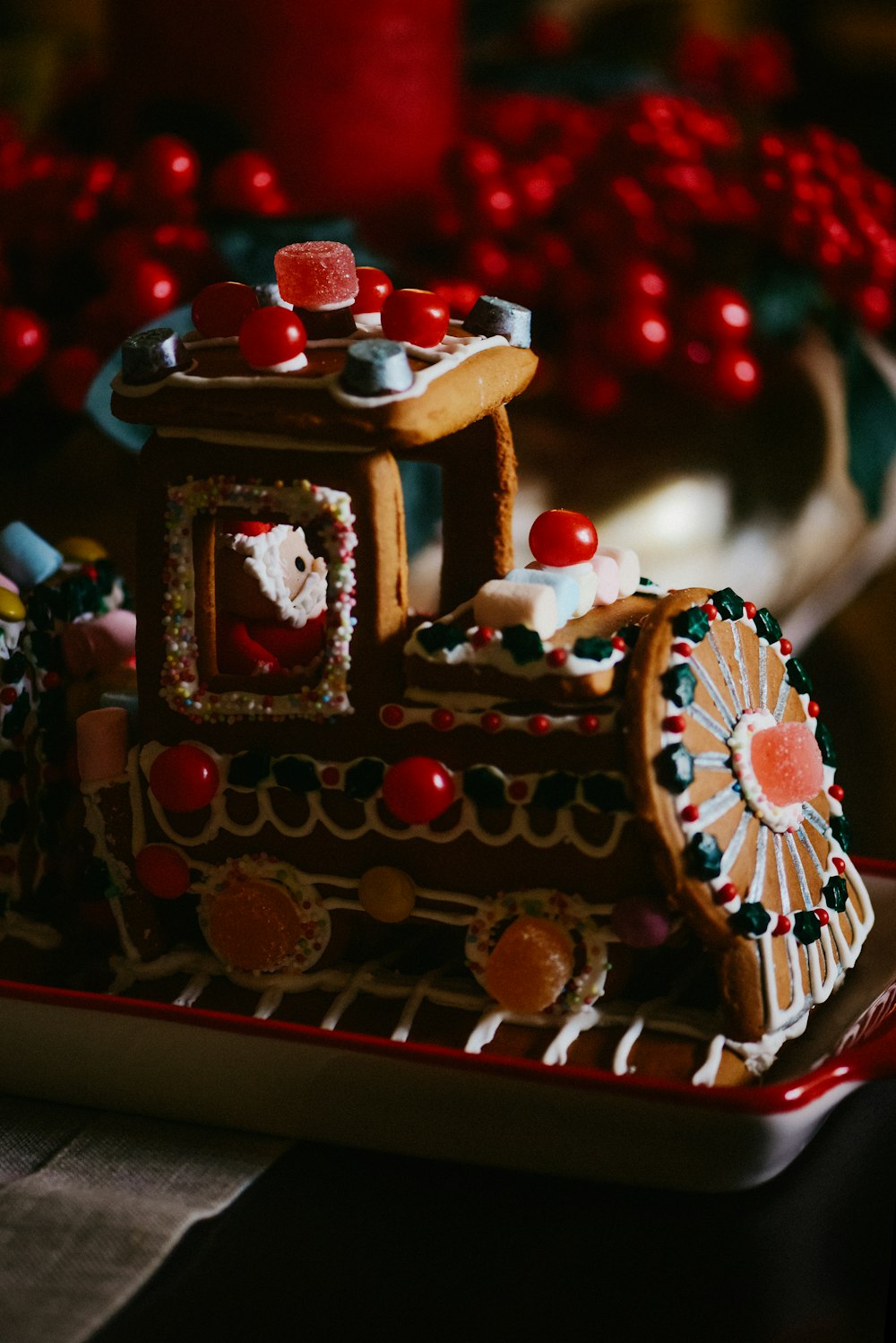 a decorated gingerbread train on a plate