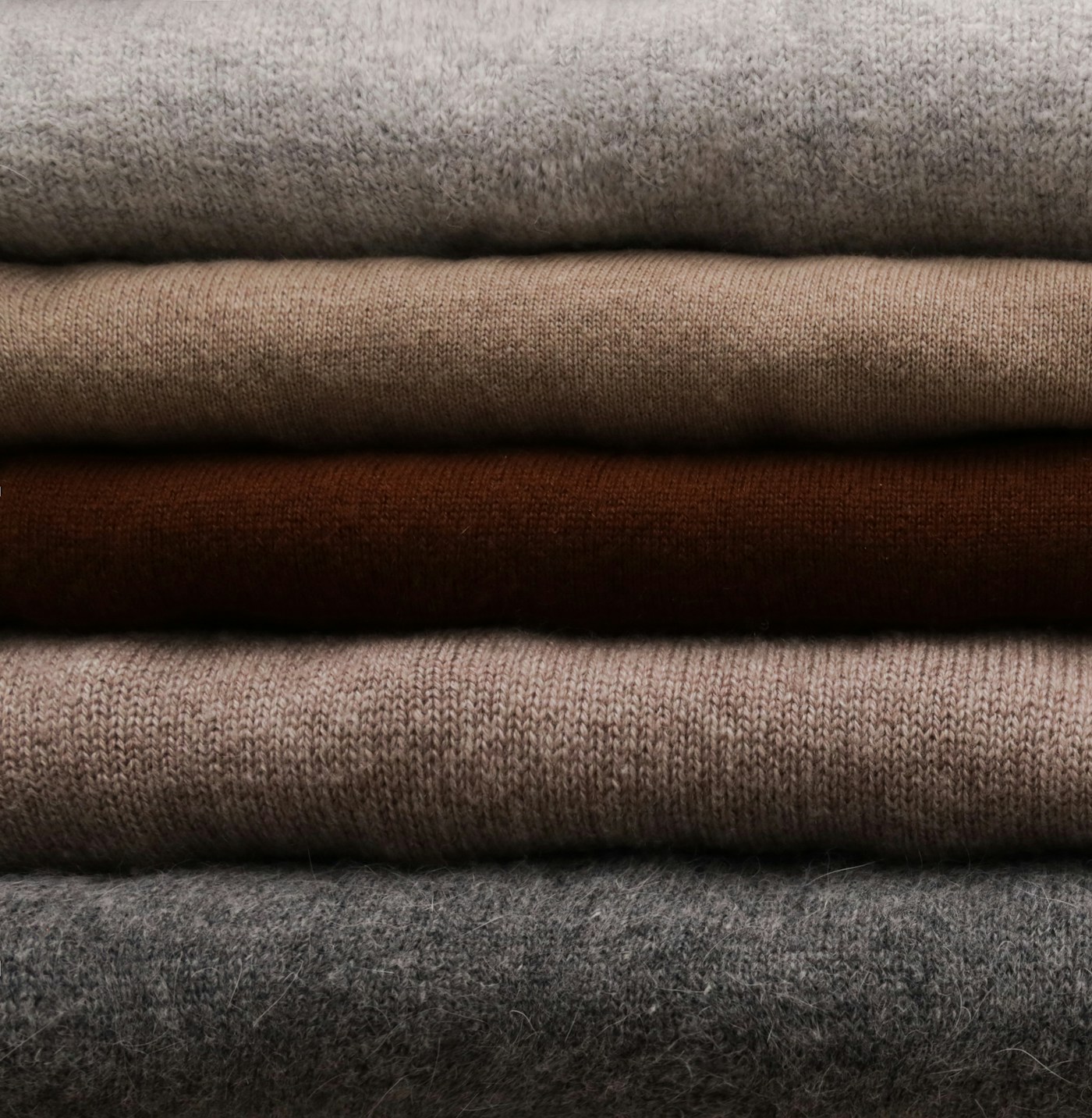 Houston Silk-Cashmere Cardigan — stack of folded cashmere colorways