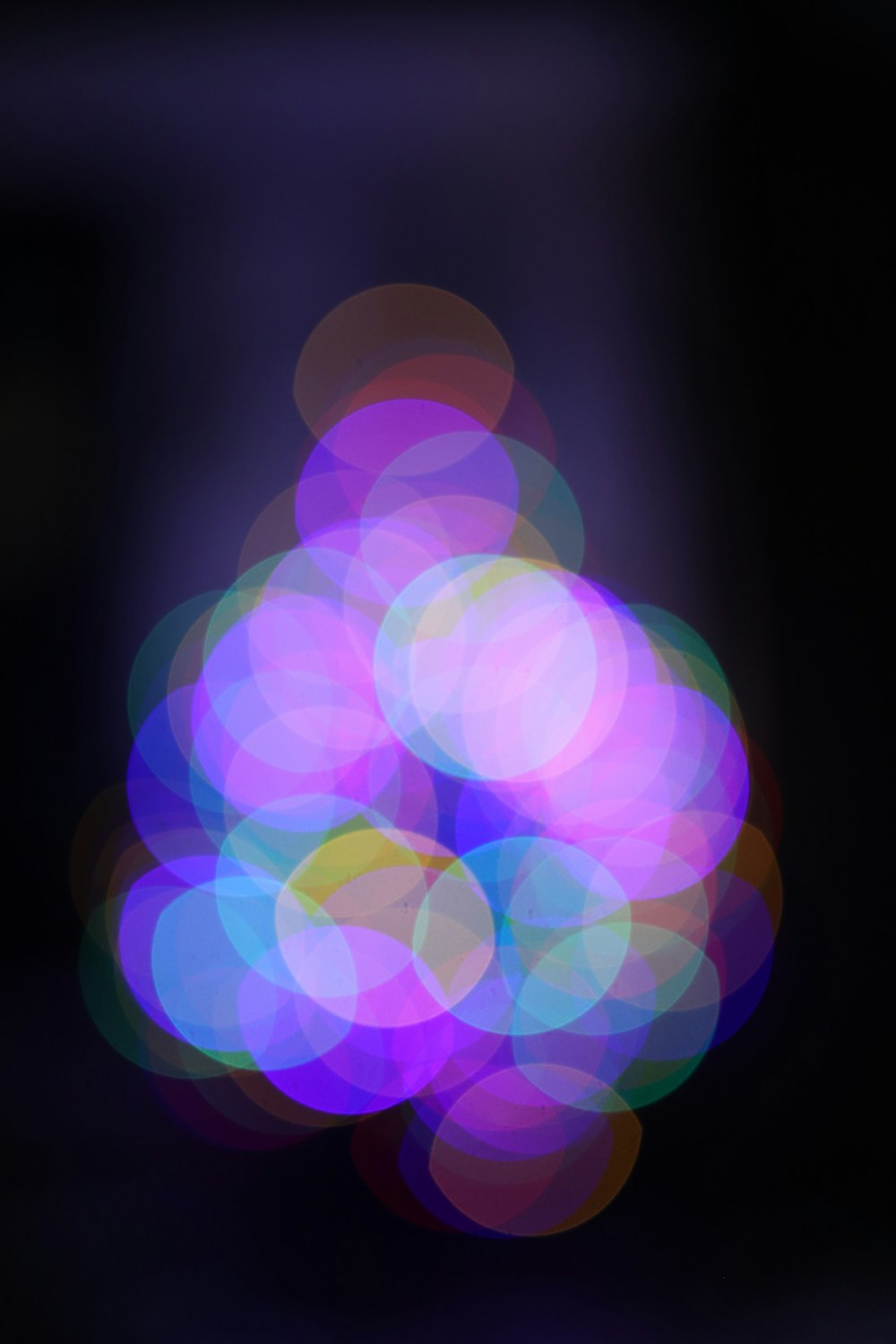 a blurry photo of a blue and purple light