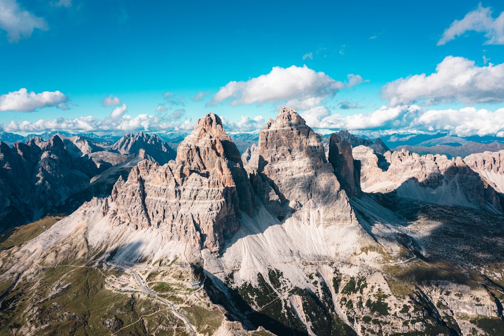 a group of mountains with a sky background