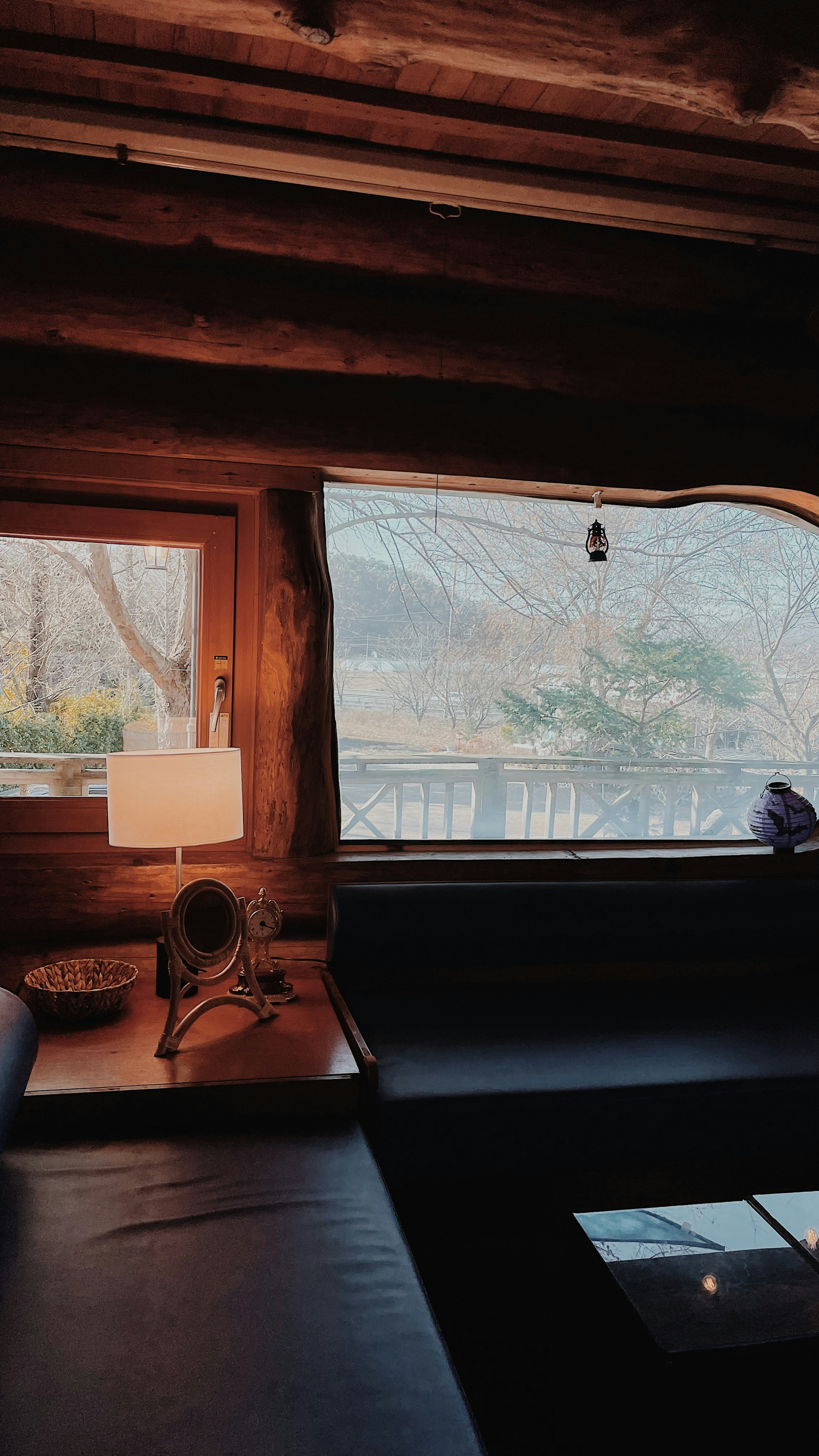 a living room with a couch and a window