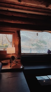 a living room with a couch and a window