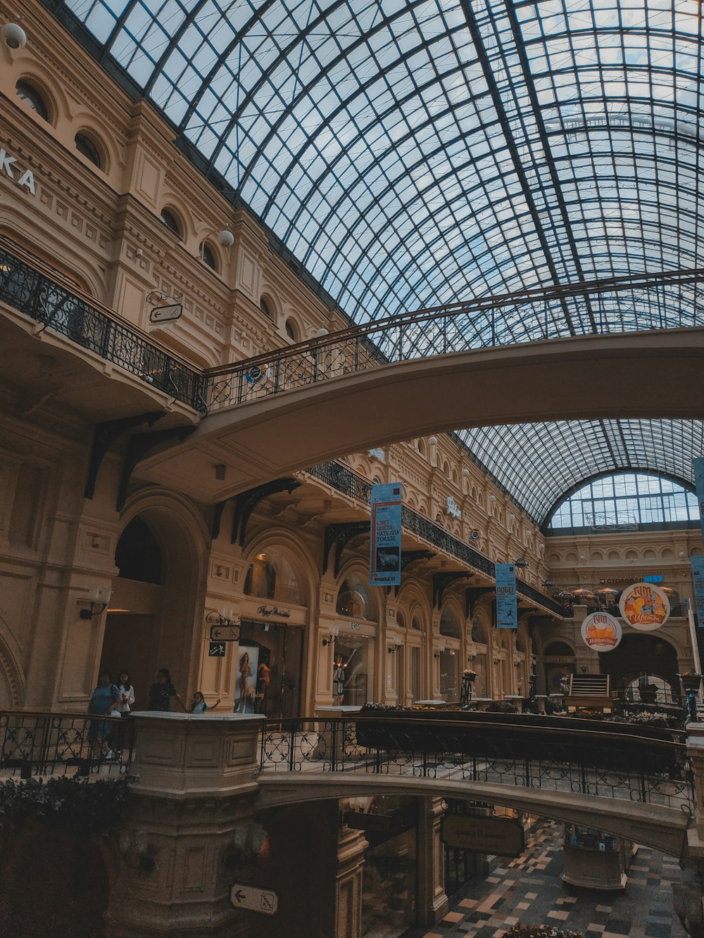 the inside of a building with a glass ceiling