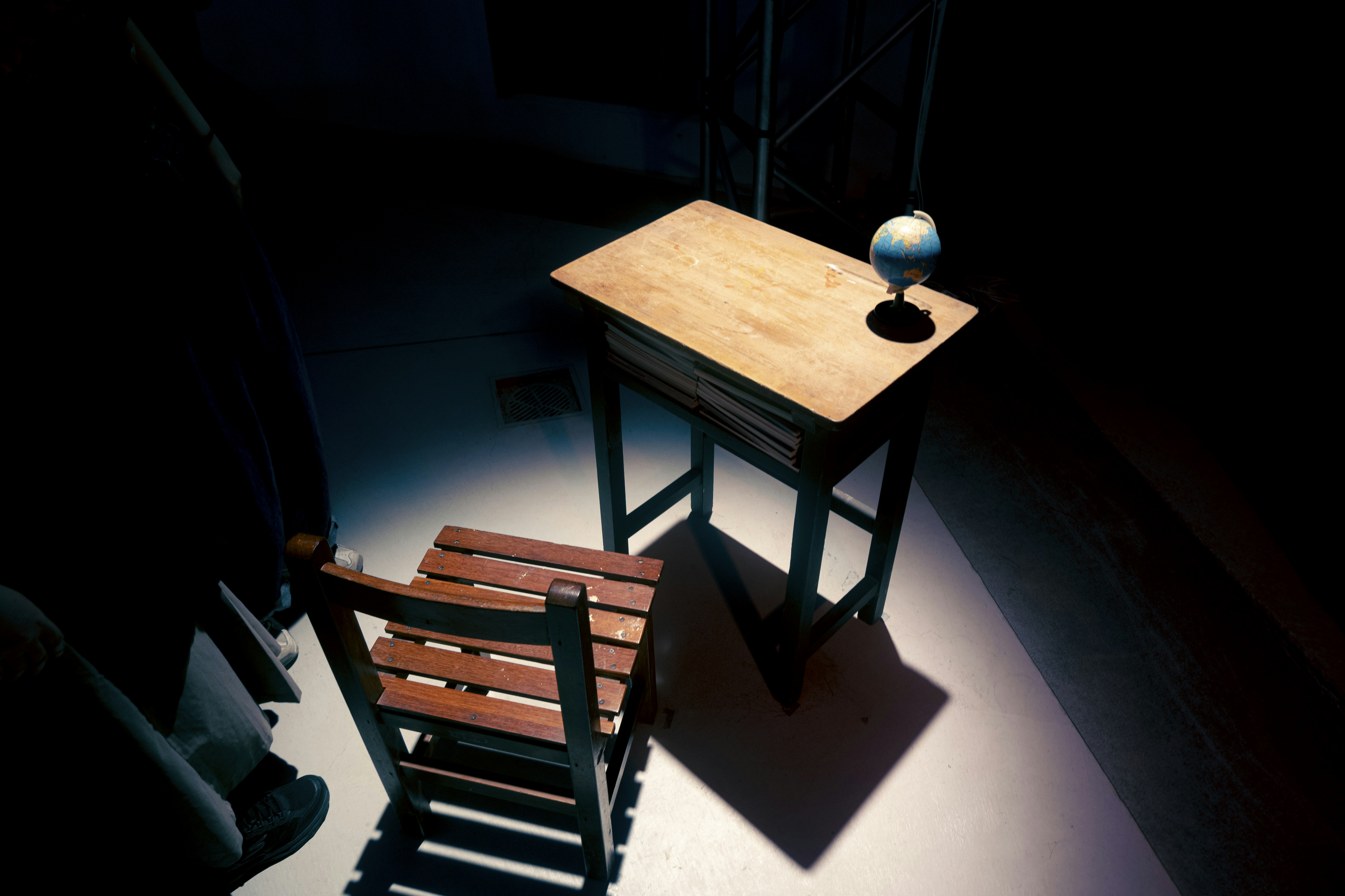 chair and table in a dark room