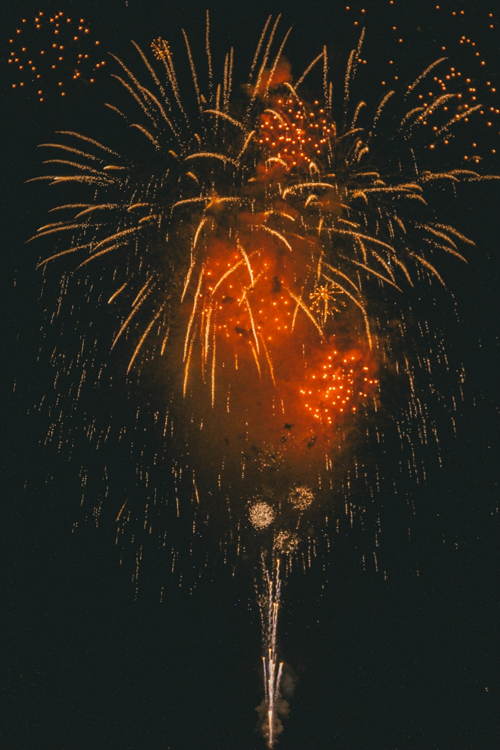 a firework display in the night sky