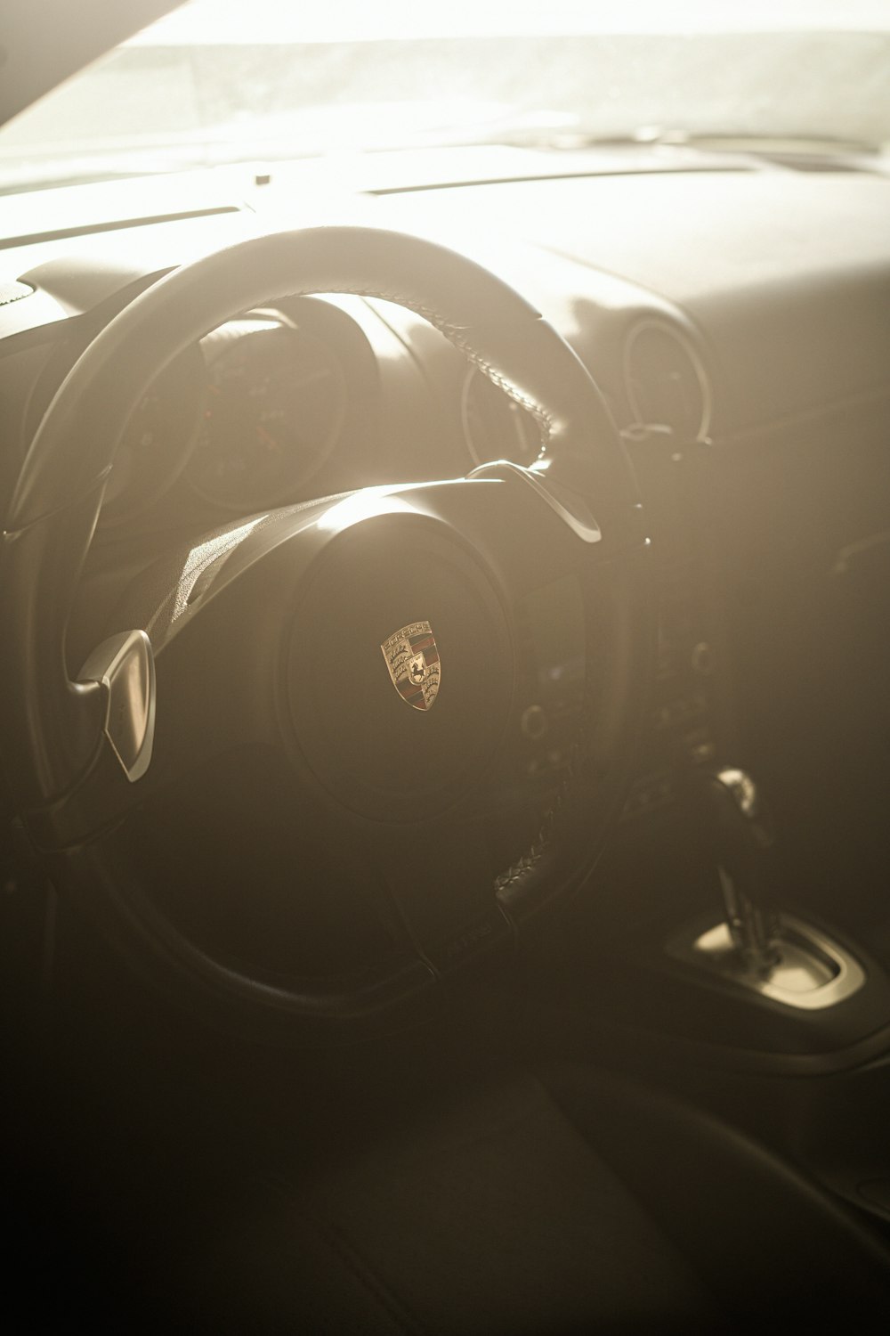 a steering wheel and dashboard of a car