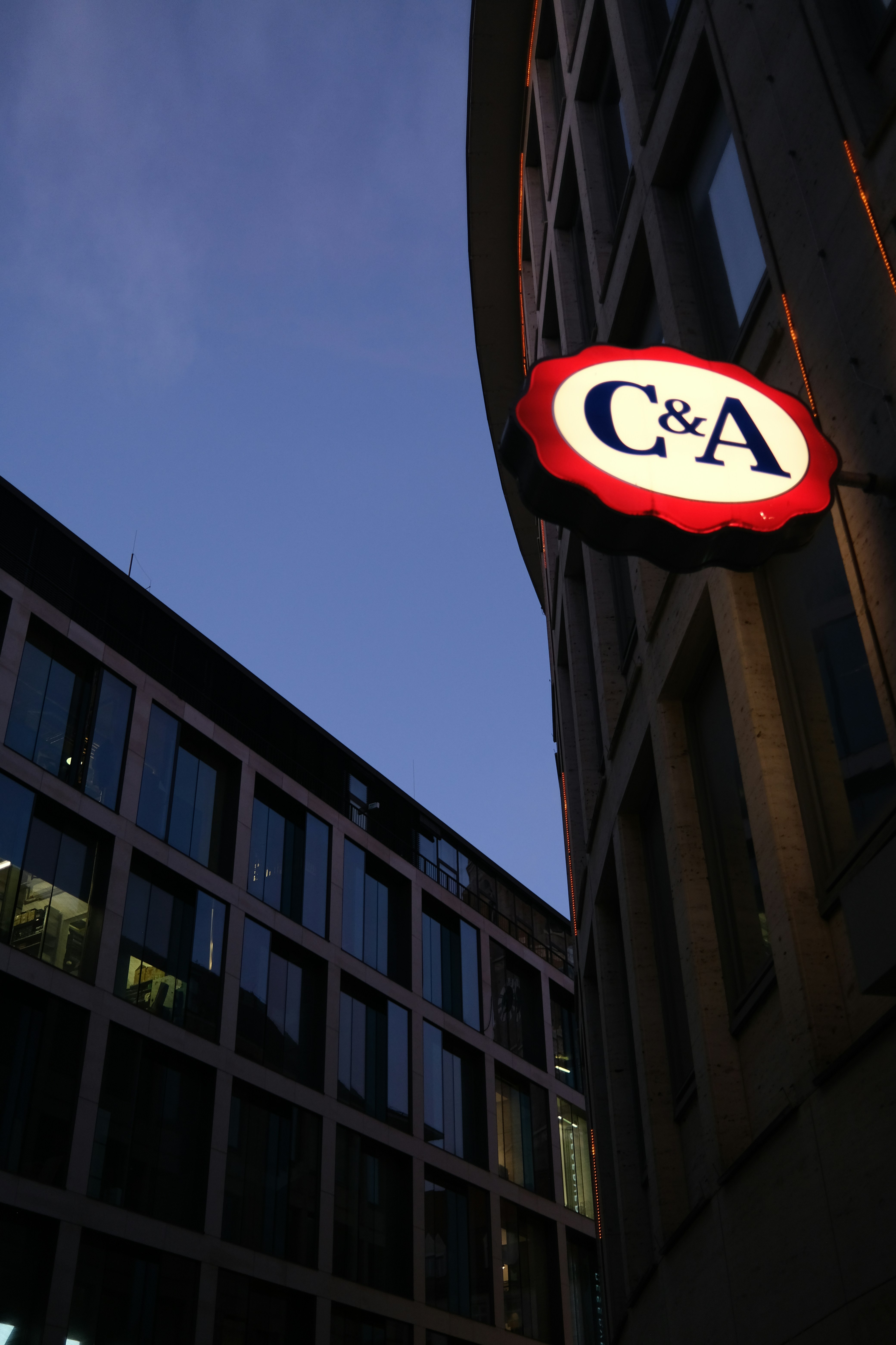 a sign on the side of a tall building