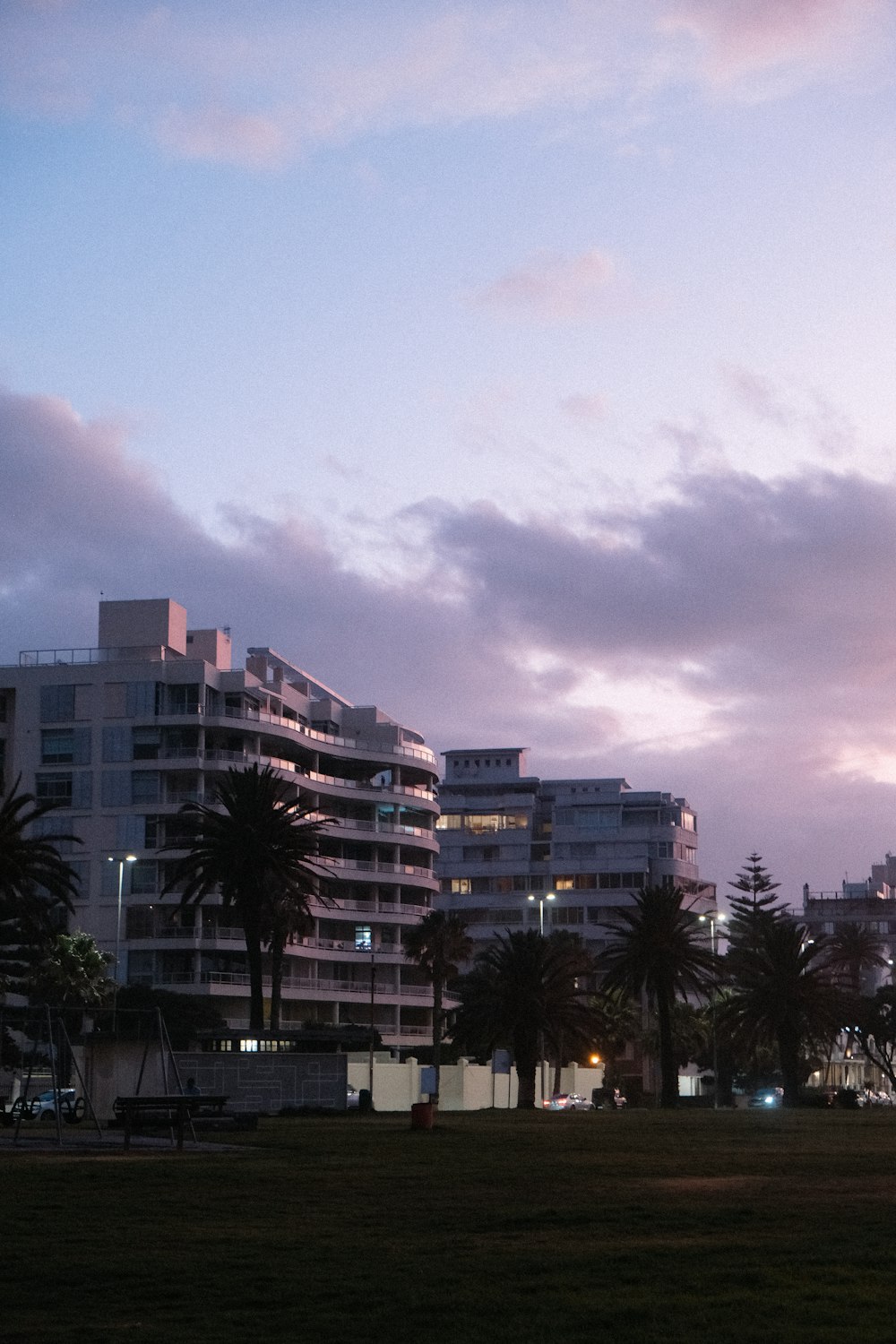 a view of a city skyline at dusk