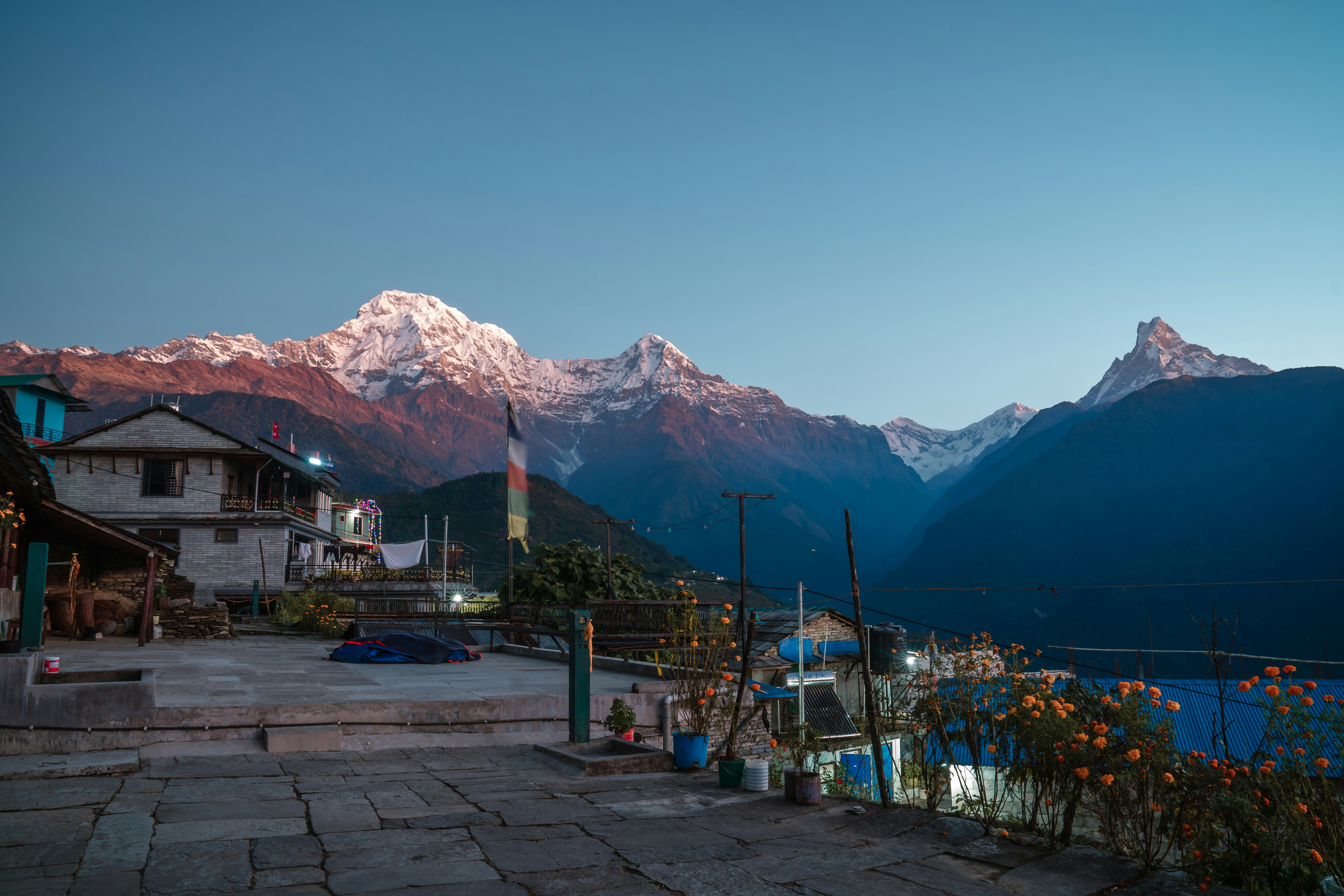 a view of a mountain range at dusk