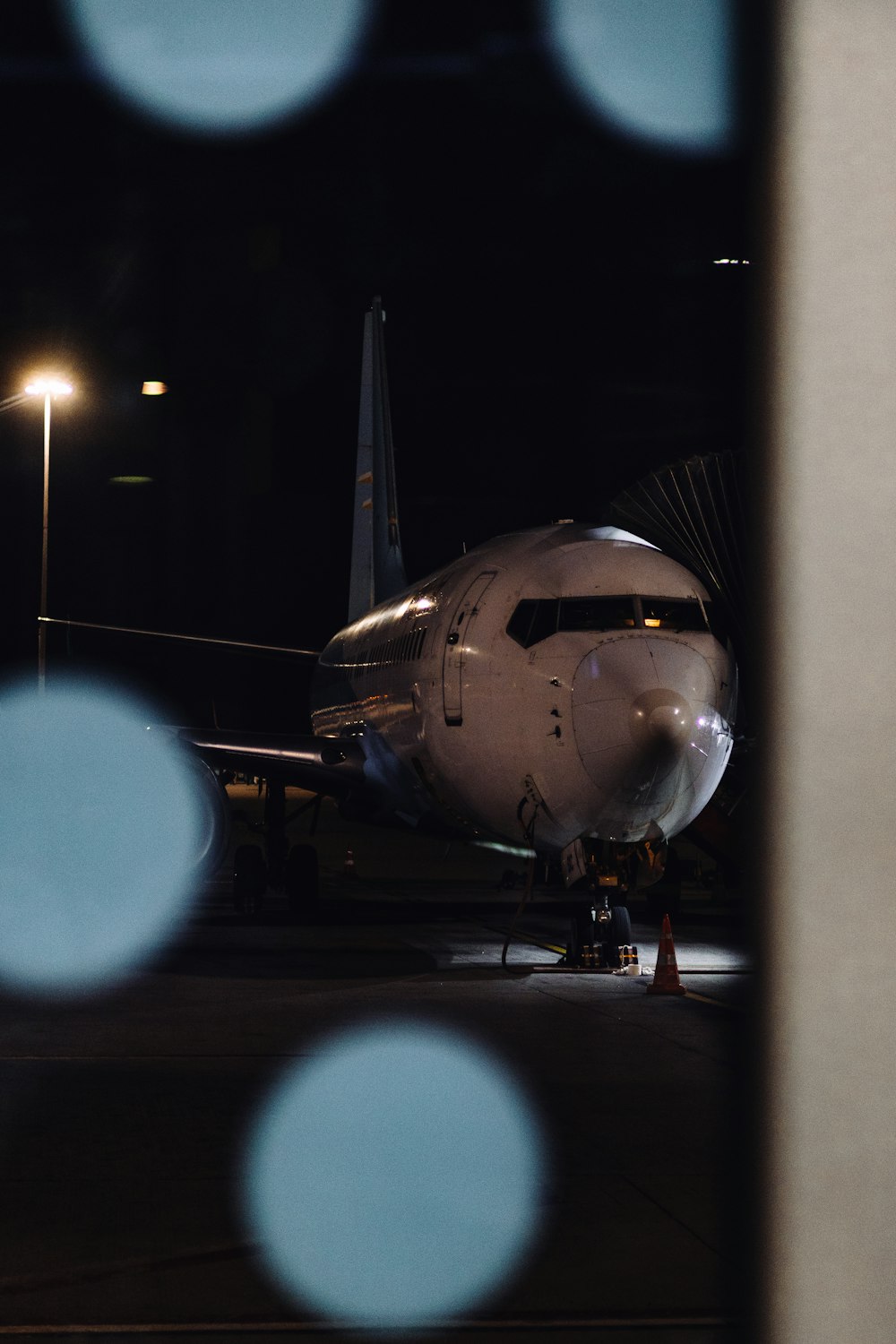 a large jetliner sitting on top of an airport tarmac