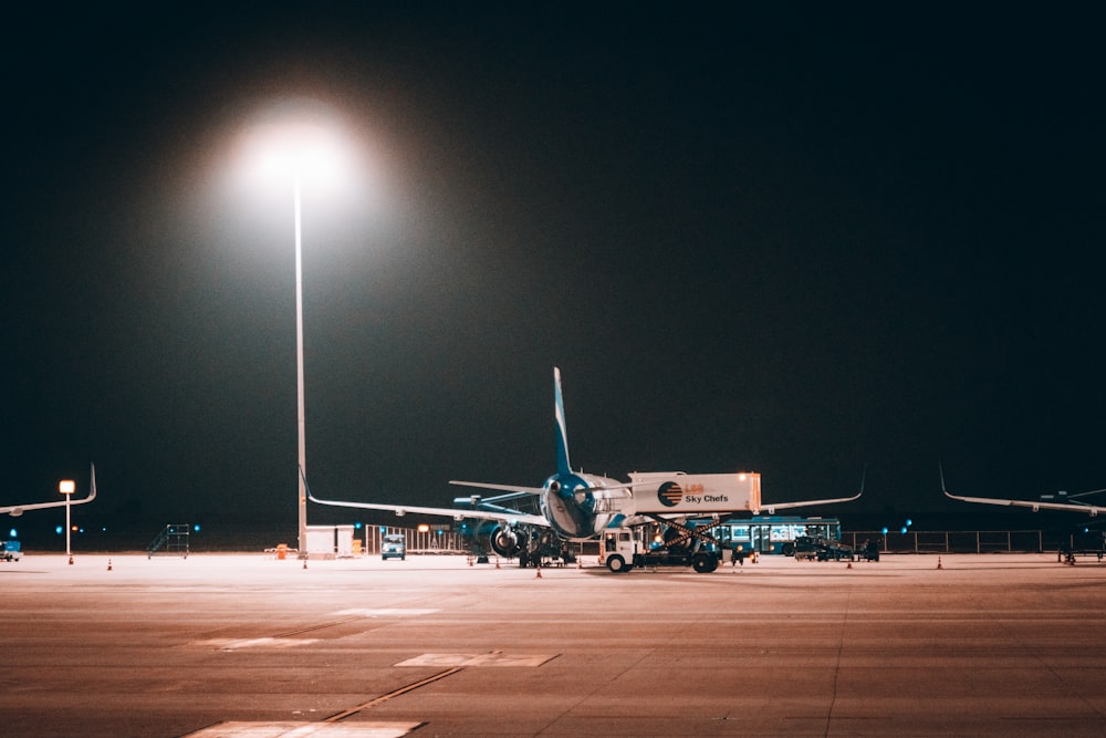 a large jetliner sitting on top of an airport tarmac