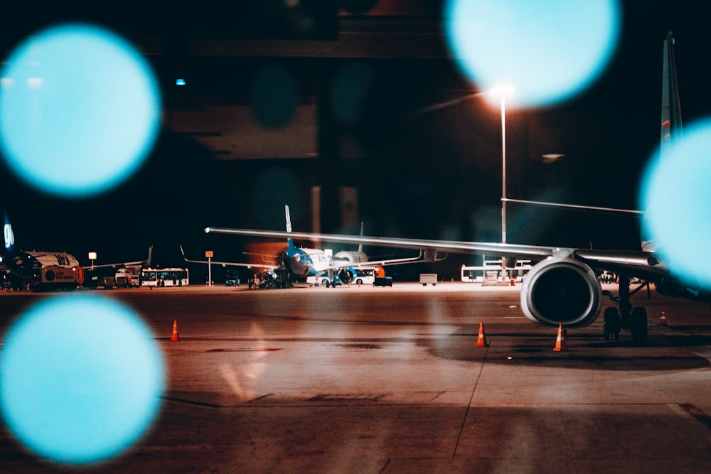 a large jetliner sitting on top of an airport tarmac