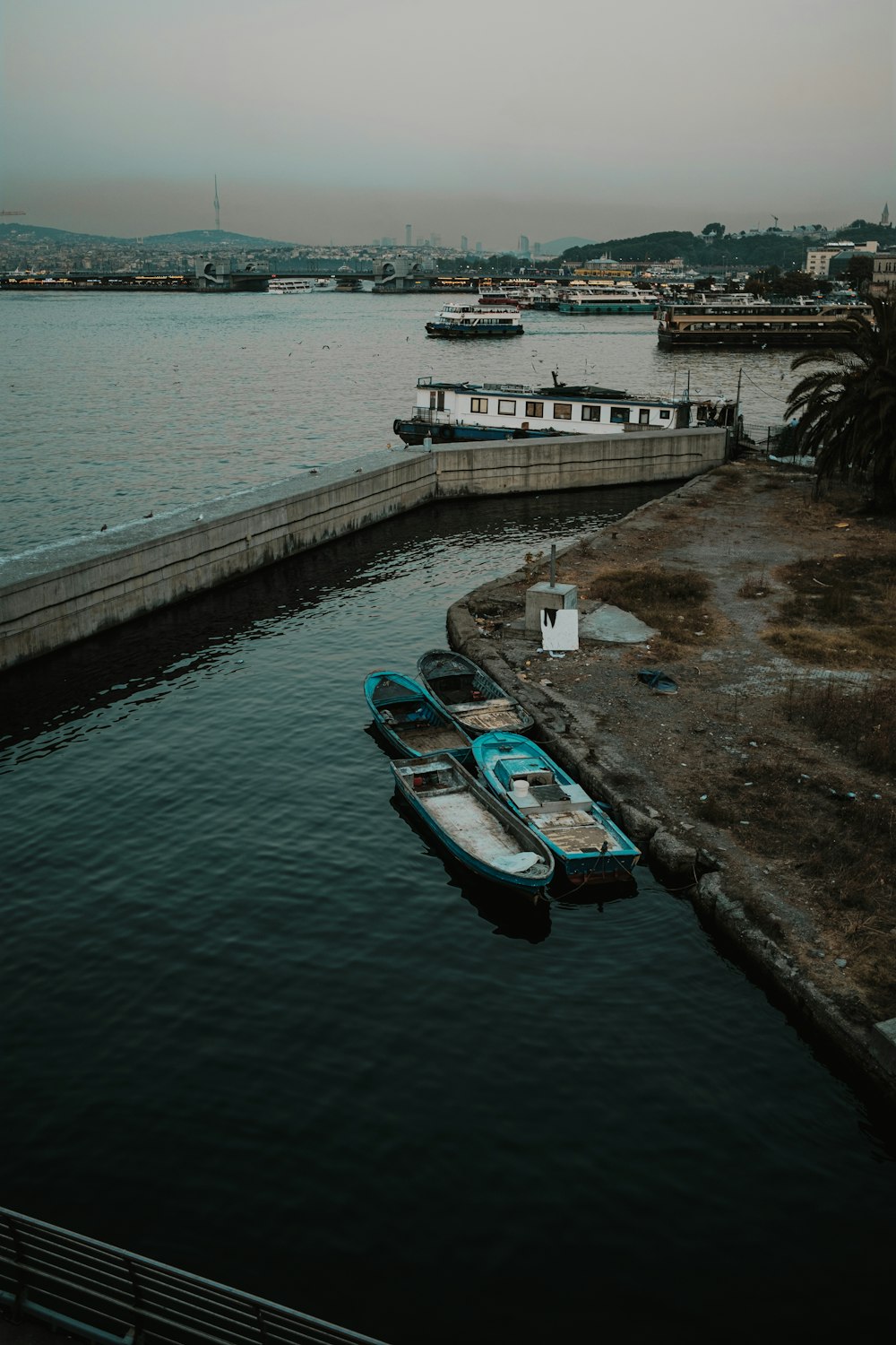 a couple of boats that are sitting in the water