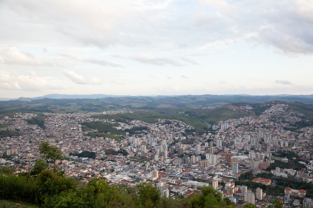 a view of a city from the top of a hill