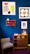 A cozy living room wall adorned with audavibe’s colorful digital artwork.