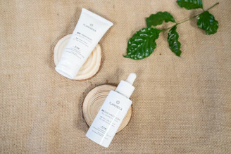 Close-up of a popular skincare product on a wooden table with soft natural light