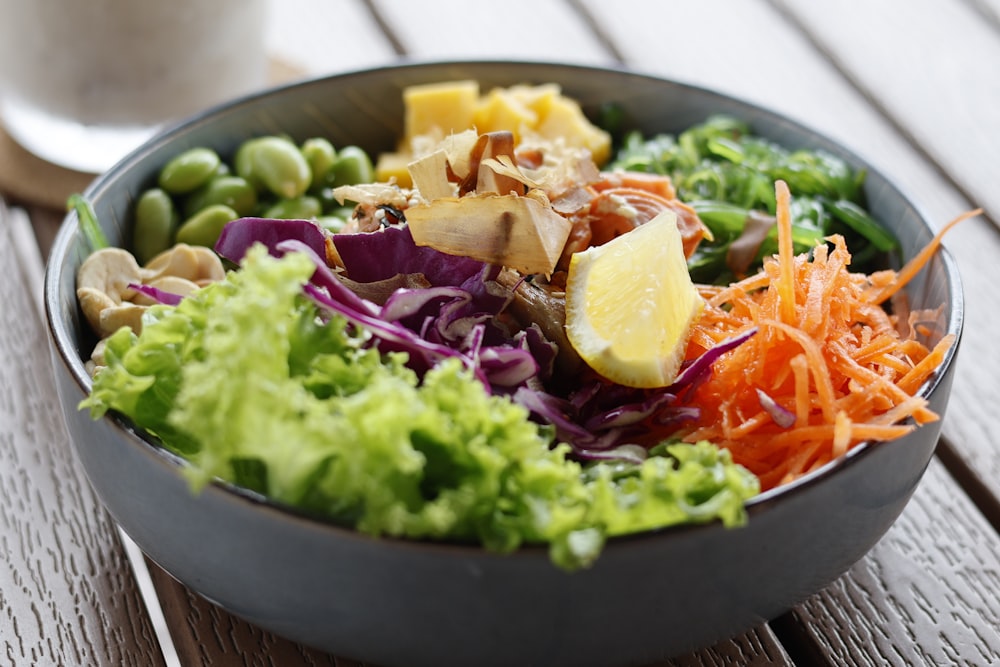 a close up of a bowl of food on a table