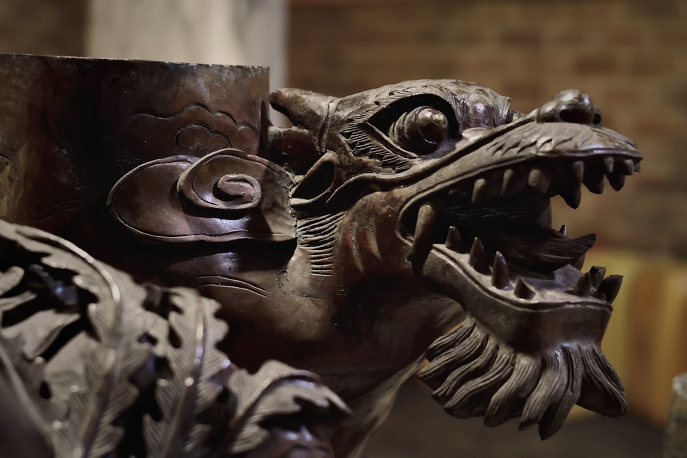 a close up of a statue of a dragon